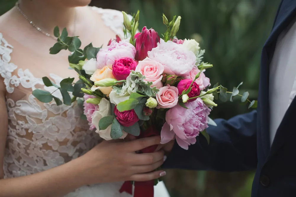 Flowers in the hand of bride