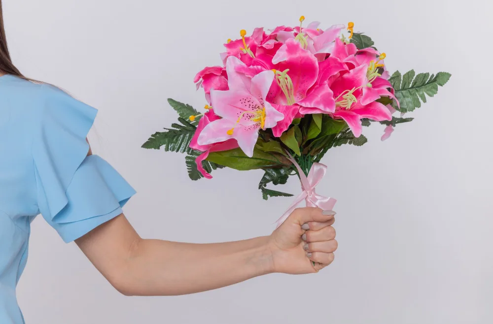 Alstroemeria flower in hand